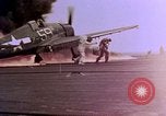 Image of F6F Hellcat aircraft on fire Pacific Ocean, 1945, second 11 stock footage video 65675050861