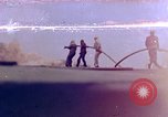 Image of F6F Hellcat aircraft on fire Pacific Ocean, 1945, second 12 stock footage video 65675050861