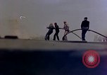 Image of F6F Hellcat aircraft on fire Pacific Ocean, 1945, second 13 stock footage video 65675050861