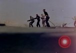Image of F6F Hellcat aircraft on fire Pacific Ocean, 1945, second 15 stock footage video 65675050861