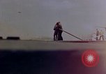 Image of F6F Hellcat aircraft on fire Pacific Ocean, 1945, second 18 stock footage video 65675050861