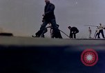 Image of F6F Hellcat aircraft on fire Pacific Ocean, 1945, second 20 stock footage video 65675050861
