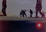 Image of F6F Hellcat aircraft on fire Pacific Ocean, 1945, second 21 stock footage video 65675050861
