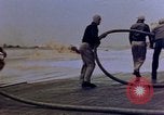 Image of F6F Hellcat aircraft on fire Pacific Ocean, 1945, second 24 stock footage video 65675050861