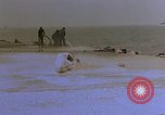 Image of F6F Hellcat aircraft on fire Pacific Ocean, 1945, second 31 stock footage video 65675050861