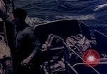 Image of F6F Hellcat aircraft on fire Pacific Ocean, 1945, second 43 stock footage video 65675050861