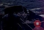 Image of F6F Hellcat aircraft on fire Pacific Ocean, 1945, second 45 stock footage video 65675050861