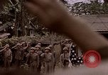 Image of American flag raising ceremony Saipan Northern Mariana Islands, 1944, second 3 stock footage video 65675050871