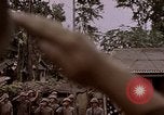 Image of American flag raising ceremony Saipan Northern Mariana Islands, 1944, second 4 stock footage video 65675050871