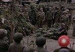 Image of American flag raising ceremony Saipan Northern Mariana Islands, 1944, second 32 stock footage video 65675050871