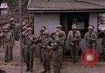Image of American flag raising ceremony Saipan Northern Mariana Islands, 1944, second 50 stock footage video 65675050871