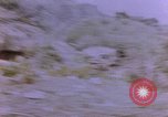 Image of American infantry searching hideouts on Saipan for Japanese soldiers Saipan Northern Mariana Islands, 1944, second 7 stock footage video 65675050872