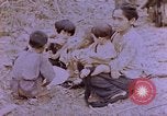 Image of American infantry searching hideouts on Saipan for Japanese soldiers Saipan Northern Mariana Islands, 1944, second 15 stock footage video 65675050872