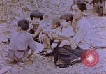 Image of American infantry searching hideouts on Saipan for Japanese soldiers Saipan Northern Mariana Islands, 1944, second 16 stock footage video 65675050872