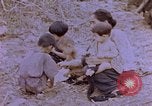 Image of American infantry searching hideouts on Saipan for Japanese soldiers Saipan Northern Mariana Islands, 1944, second 18 stock footage video 65675050872