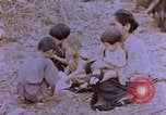 Image of American infantry searching hideouts on Saipan for Japanese soldiers Saipan Northern Mariana Islands, 1944, second 19 stock footage video 65675050872