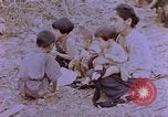Image of American infantry searching hideouts on Saipan for Japanese soldiers Saipan Northern Mariana Islands, 1944, second 20 stock footage video 65675050872
