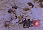 Image of American infantry searching hideouts on Saipan for Japanese soldiers Saipan Northern Mariana Islands, 1944, second 21 stock footage video 65675050872