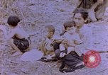Image of American infantry searching hideouts on Saipan for Japanese soldiers Saipan Northern Mariana Islands, 1944, second 22 stock footage video 65675050872