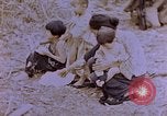 Image of American infantry searching hideouts on Saipan for Japanese soldiers Saipan Northern Mariana Islands, 1944, second 25 stock footage video 65675050872