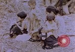 Image of American infantry searching hideouts on Saipan for Japanese soldiers Saipan Northern Mariana Islands, 1944, second 26 stock footage video 65675050872