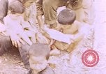 Image of American infantry searching hideouts on Saipan for Japanese soldiers Saipan Northern Mariana Islands, 1944, second 29 stock footage video 65675050872