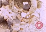 Image of American infantry searching hideouts on Saipan for Japanese soldiers Saipan Northern Mariana Islands, 1944, second 30 stock footage video 65675050872