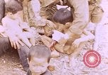 Image of American infantry searching hideouts on Saipan for Japanese soldiers Saipan Northern Mariana Islands, 1944, second 31 stock footage video 65675050872