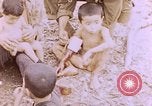 Image of American infantry searching hideouts on Saipan for Japanese soldiers Saipan Northern Mariana Islands, 1944, second 35 stock footage video 65675050872