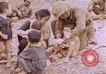 Image of American infantry searching hideouts on Saipan for Japanese soldiers Saipan Northern Mariana Islands, 1944, second 37 stock footage video 65675050872