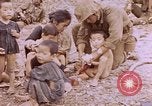 Image of American infantry searching hideouts on Saipan for Japanese soldiers Saipan Northern Mariana Islands, 1944, second 38 stock footage video 65675050872