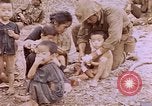 Image of American infantry searching hideouts on Saipan for Japanese soldiers Saipan Northern Mariana Islands, 1944, second 39 stock footage video 65675050872