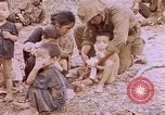 Image of American infantry searching hideouts on Saipan for Japanese soldiers Saipan Northern Mariana Islands, 1944, second 40 stock footage video 65675050872