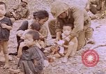 Image of American infantry searching hideouts on Saipan for Japanese soldiers Saipan Northern Mariana Islands, 1944, second 41 stock footage video 65675050872