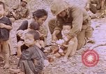 Image of American infantry searching hideouts on Saipan for Japanese soldiers Saipan Northern Mariana Islands, 1944, second 42 stock footage video 65675050872