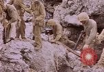 Image of American infantry searching hideouts on Saipan for Japanese soldiers Saipan Northern Mariana Islands, 1944, second 44 stock footage video 65675050872