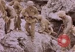 Image of American infantry searching hideouts on Saipan for Japanese soldiers Saipan Northern Mariana Islands, 1944, second 45 stock footage video 65675050872