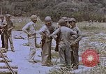 Image of Japanese prisoners and civilians Saipan Northern Mariana Islands, 1944, second 23 stock footage video 65675050875