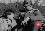Image of German soldiers greeted by Austrians during Anschluss Austria, 1938, second 4 stock footage video 65675050939