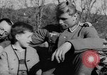 Image of German soldiers greeted by Austrians during Anschluss Austria, 1938, second 5 stock footage video 65675050939