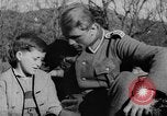 Image of German soldiers greeted by Austrians during Anschluss Austria, 1938, second 8 stock footage video 65675050939