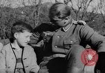 Image of German soldiers greeted by Austrians during Anschluss Austria, 1938, second 9 stock footage video 65675050939