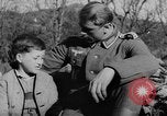 Image of German soldiers greeted by Austrians during Anschluss Austria, 1938, second 10 stock footage video 65675050939