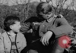 Image of German soldiers greeted by Austrians during Anschluss Austria, 1938, second 11 stock footage video 65675050939