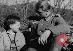Image of German soldiers greeted by Austrians during Anschluss Austria, 1938, second 13 stock footage video 65675050939