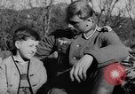Image of German soldiers greeted by Austrians during Anschluss Austria, 1938, second 14 stock footage video 65675050939