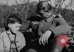 Image of German soldiers greeted by Austrians during Anschluss Austria, 1938, second 15 stock footage video 65675050939