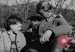 Image of German soldiers greeted by Austrians during Anschluss Austria, 1938, second 19 stock footage video 65675050939