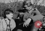 Image of German soldiers greeted by Austrians during Anschluss Austria, 1938, second 21 stock footage video 65675050939