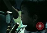 Standbild Vietnamesischer Flüchtlingskinder in den Vereinigten Staaten Florida United States USA, 1975, aus Sekunde 58 historischem Filmmaterial Videoclip 65675050943